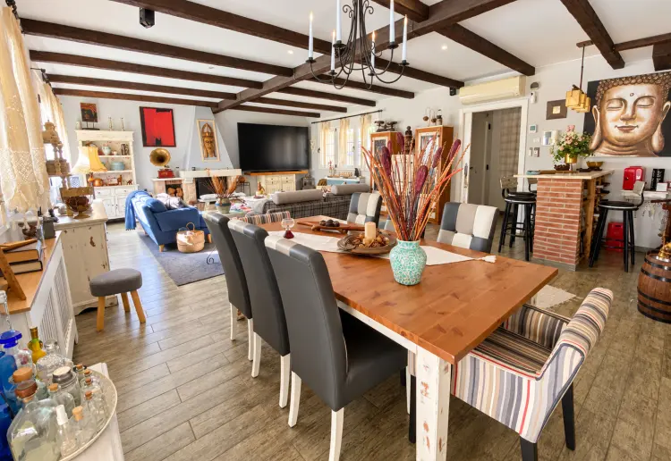 Three-storey rustic house with swimming pool, garden and large covered porch
