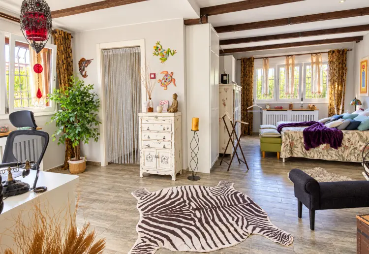 Three-storey rustic house with swimming pool, garden and large covered porch