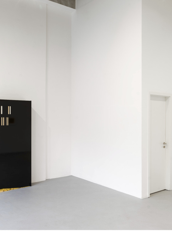 A gallery space with a ceiling height of approximately three meters.