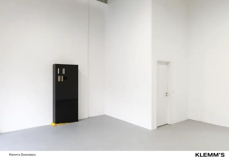 A gallery space with a ceiling height of approximately three meters.