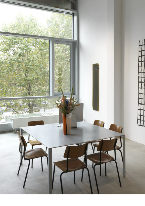 A gallery space with a ceiling height of approximately three meters.