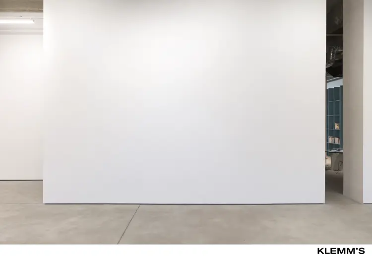 A gallery space with a ceiling height of approximately three meters.