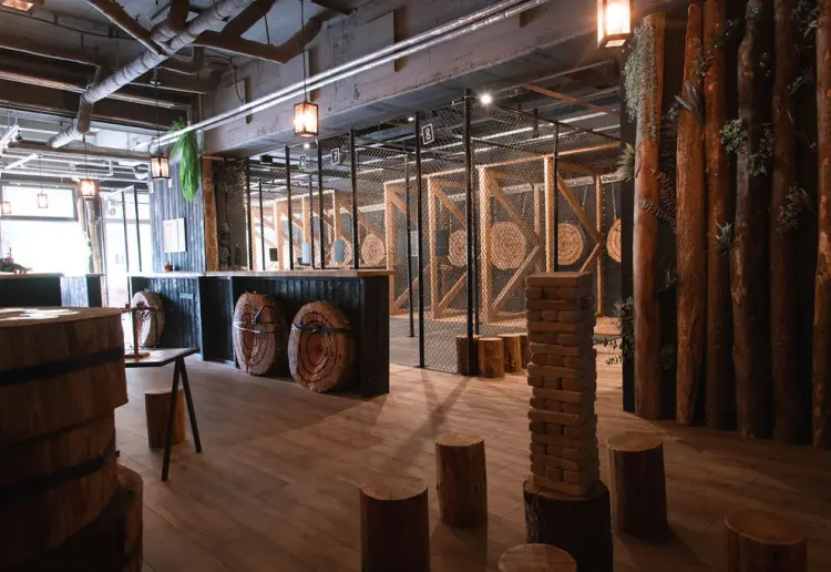 Unique forest-themed axe-throwing venue in Berlin-Mitte.