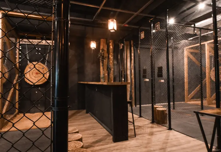 Unique forest-themed axe-throwing venue in Berlin-Mitte.
