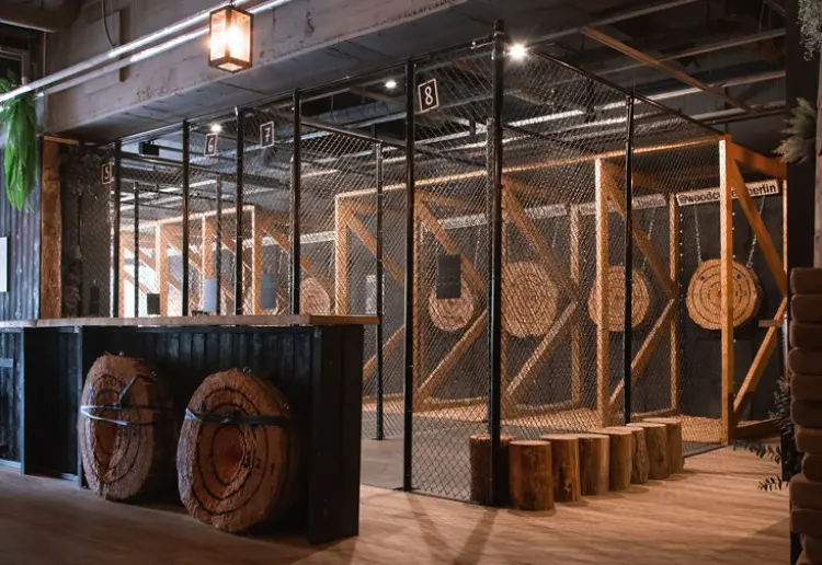 Unique forest-themed axe-throwing venue in Berlin-Mitte.