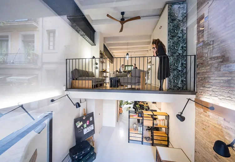 large windowed street level showroom with vintage vibe in barcelona city center