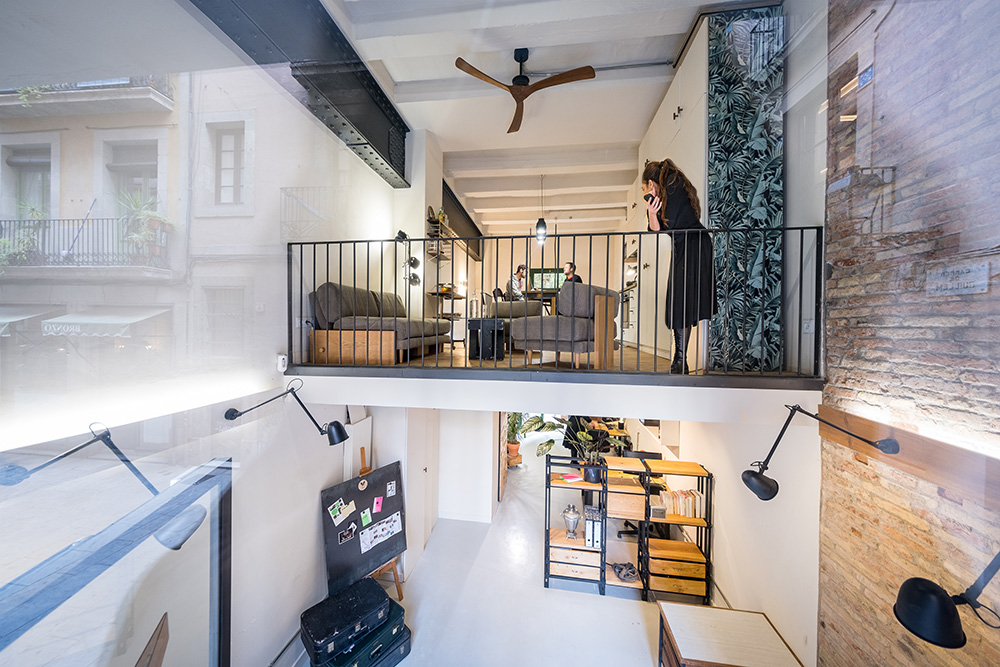 large windowed streetlevel showroom with vintage vibe in barcelona city center