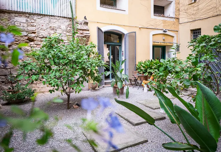 large windowed street level showroom with vintage vibe in barcelona city center