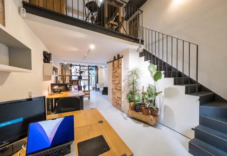 large windowed street level showroom with vintage vibe in barcelona city center