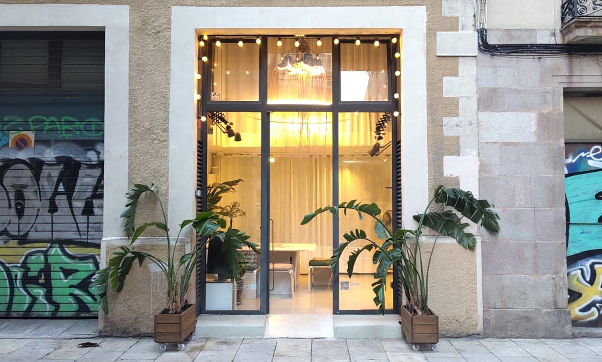 large windowed street level showroom with vintage vibe in barcelona city center