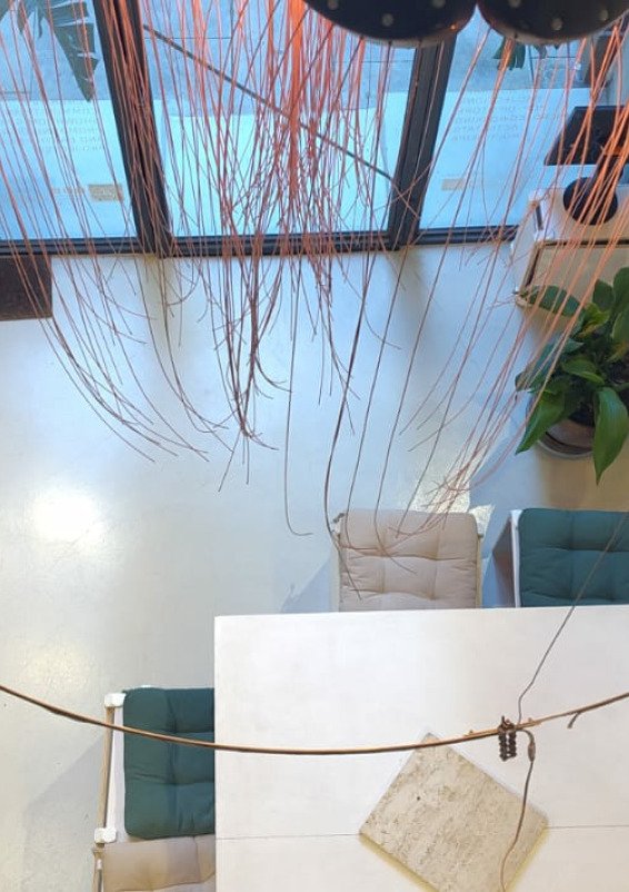 large windowed street level showroom with vintage vibe in barcelona city center