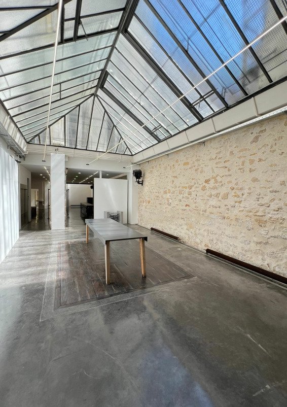 Bright 150m² Fashion Showroom with Verrière Roofs in Le Marais