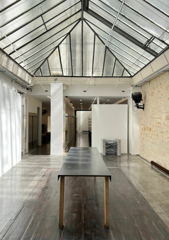 Bright 150m² Fashion Showroom with Verrière Roofs in Le Marais