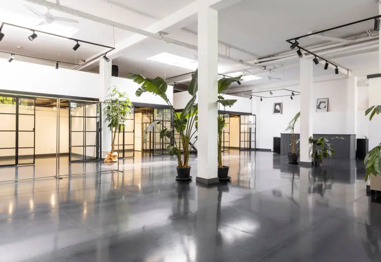Industrial-style showroom in the Prada Foundation area
