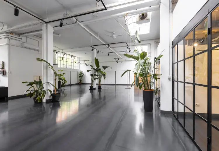 Industrial-style showroom in the Prada Foundation area
