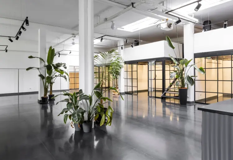 Industrial-style showroom in the Prada Foundation area