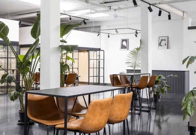 Industrial-style showroom in the Prada Foundation area