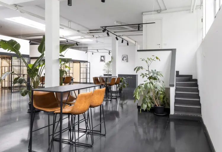 Industrial-style showroom in the Prada Foundation area