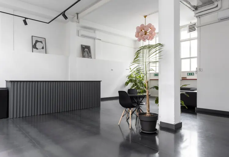 Industrial-style showroom in the Prada Foundation area