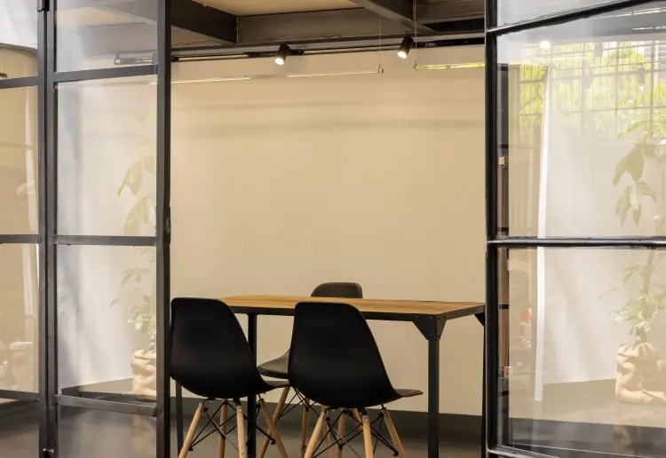 Industrial-style showroom in the Prada Foundation area