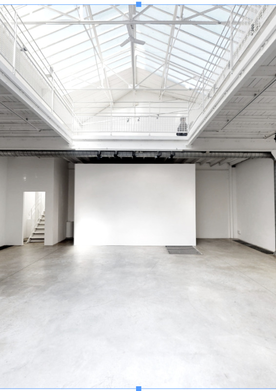 a two-level space with a magnificent glass roof