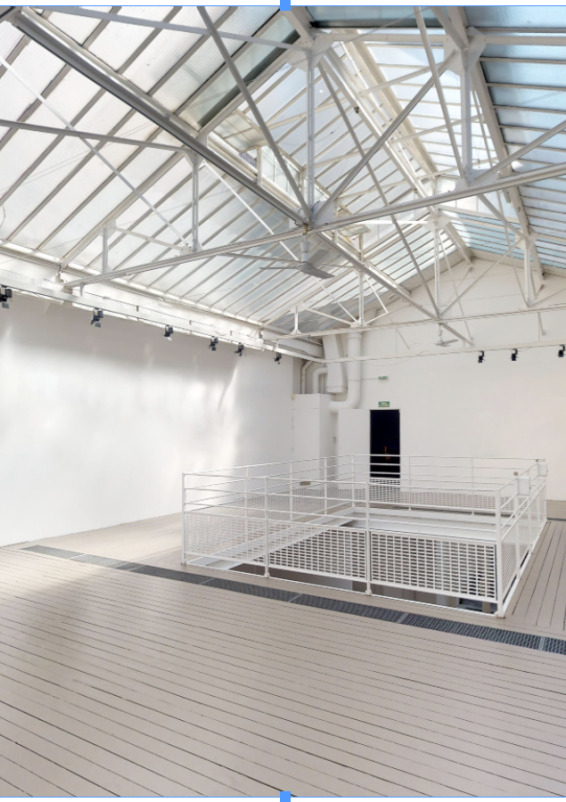 a two-level space with a magnificent glass roof