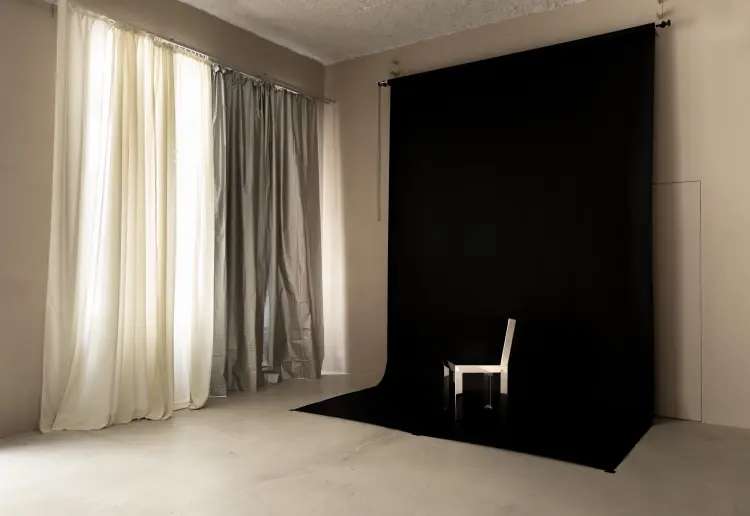 Minimalist gallery with concrete floors and walls